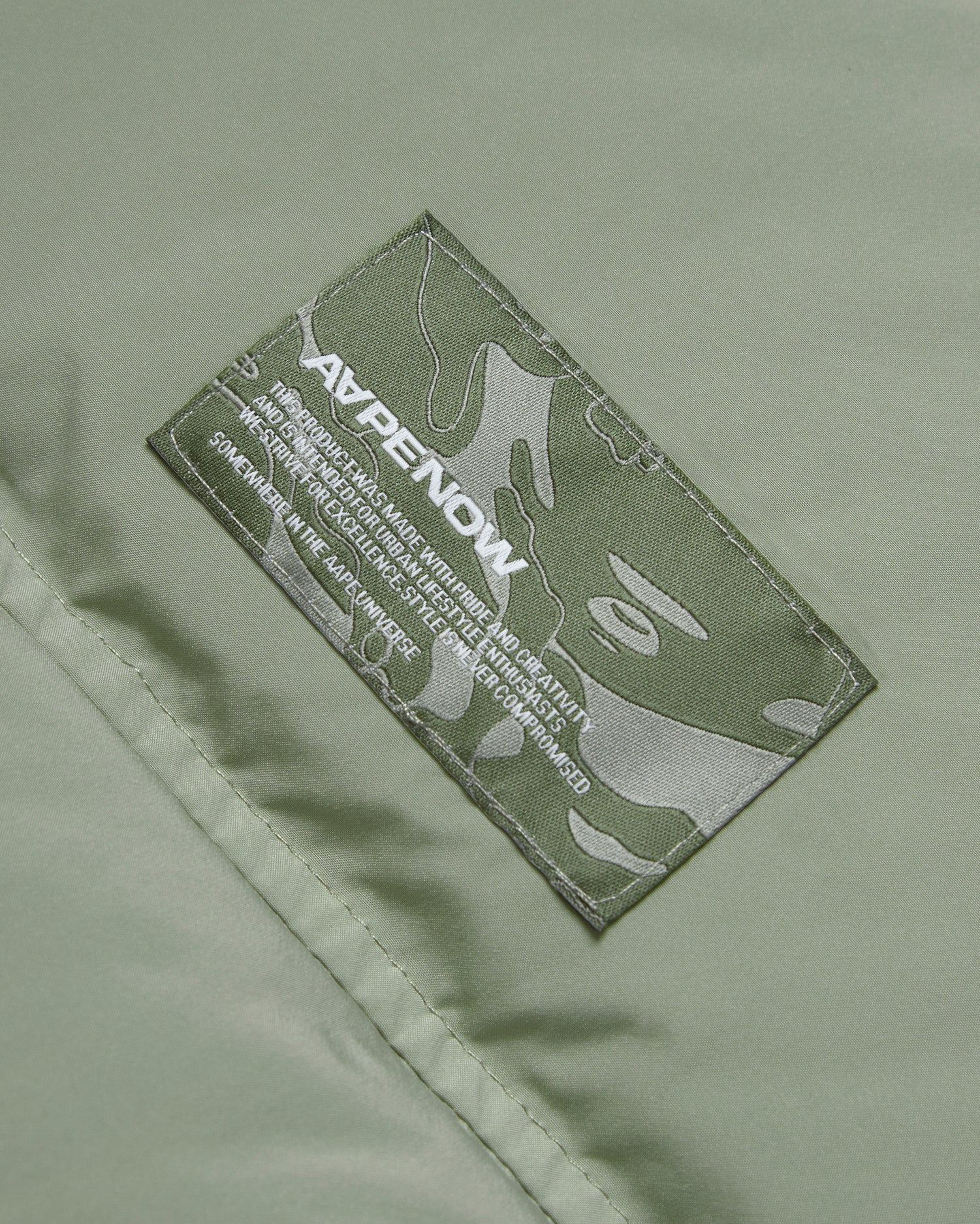 Moonface patch down vest - Image 14