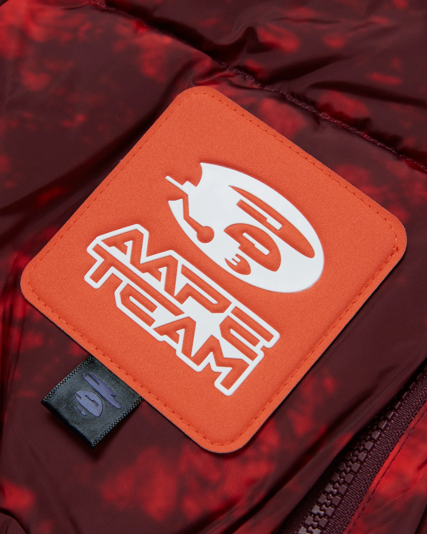 Moonface patch tie-dye down vest - Image 9