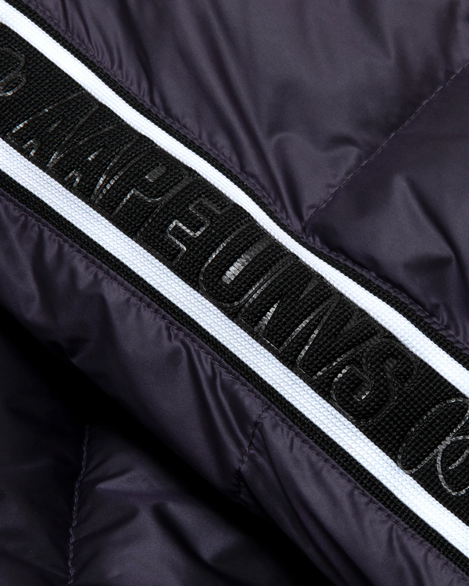 Moonface patch reversible puffer jacket - Image 14