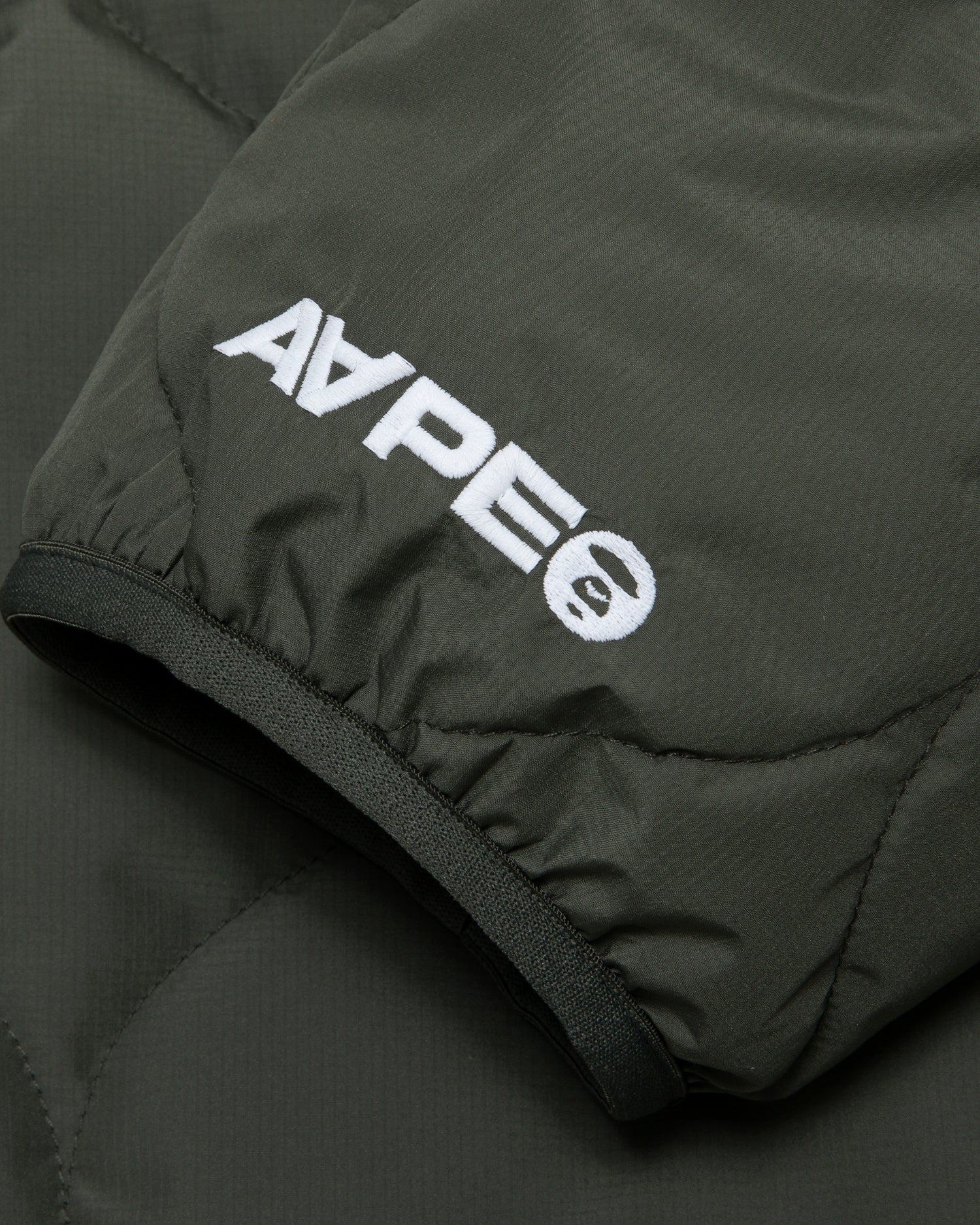 Moonface patch hooded quilted jacket - Image 13