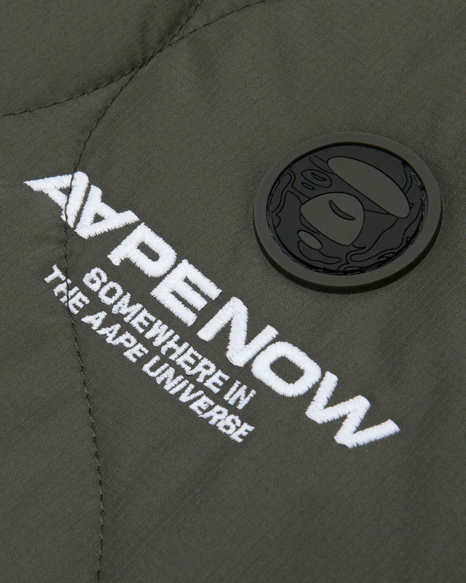 Moonface patch hooded quilted jacket - Image 15