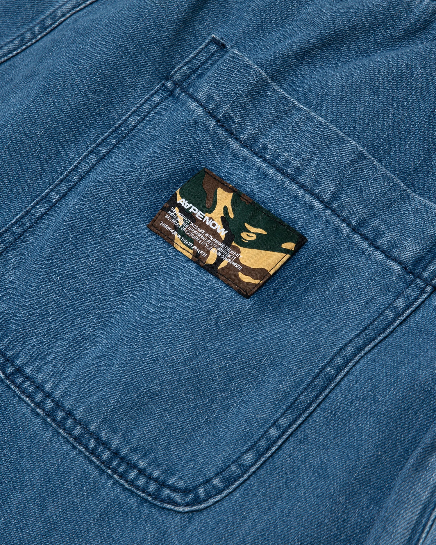 Moonface patch relaxed denim pants - Image 8