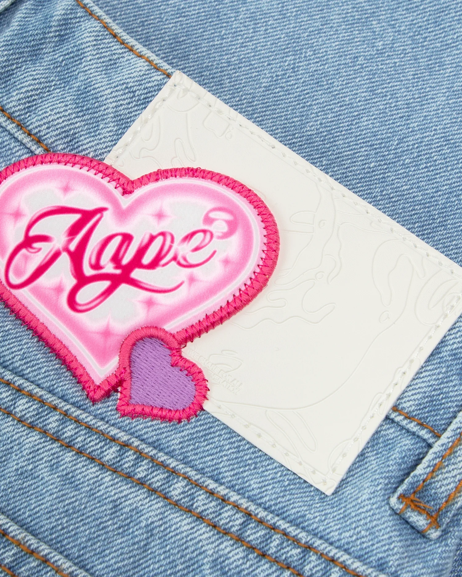 Moonface patch distressed jeans - Image 10