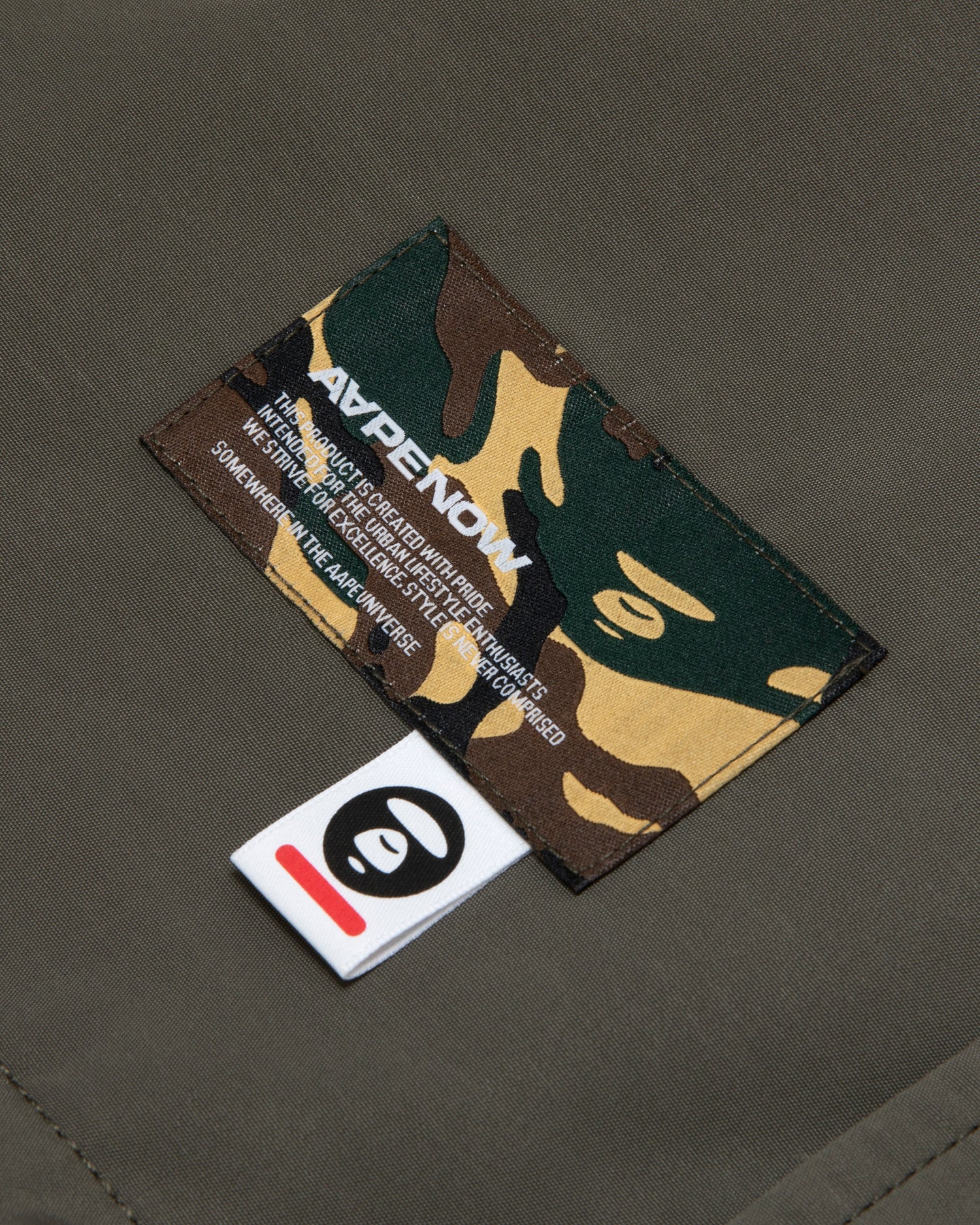 Moonface patch coach jacket - Image 14