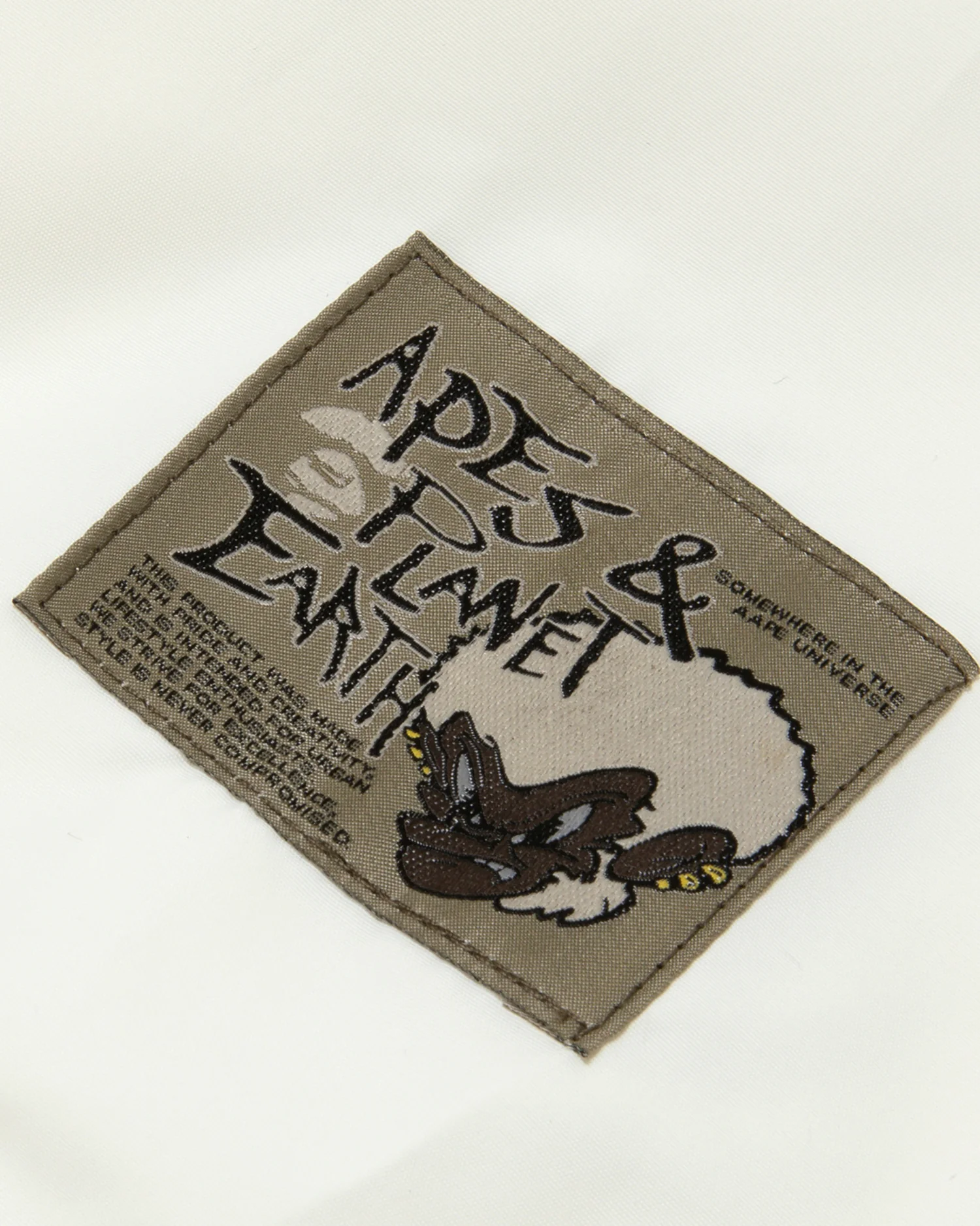 Moonface embroidered baseball jacket - Image 14