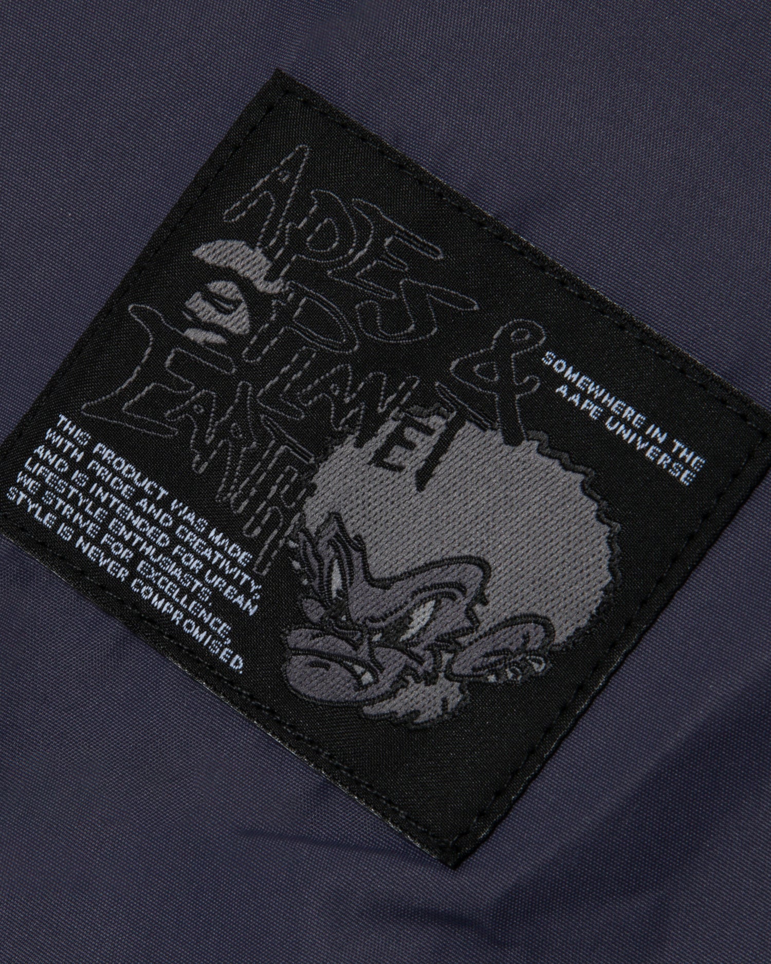 Moonface embroidered baseball jacket - Image 9