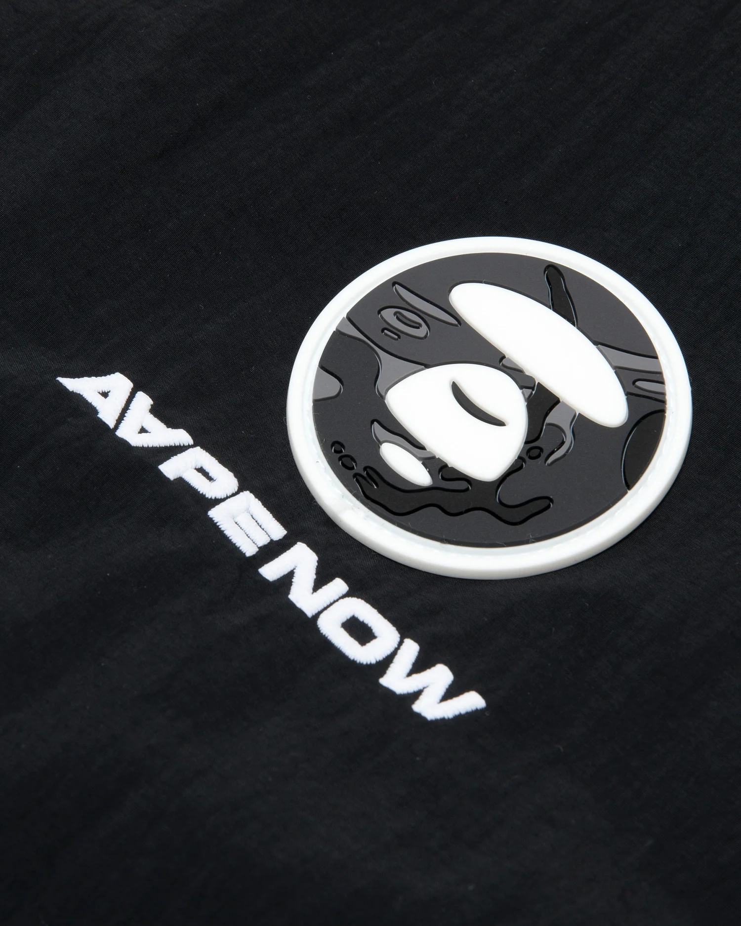 Moonface patch nylon blouson - Image 10