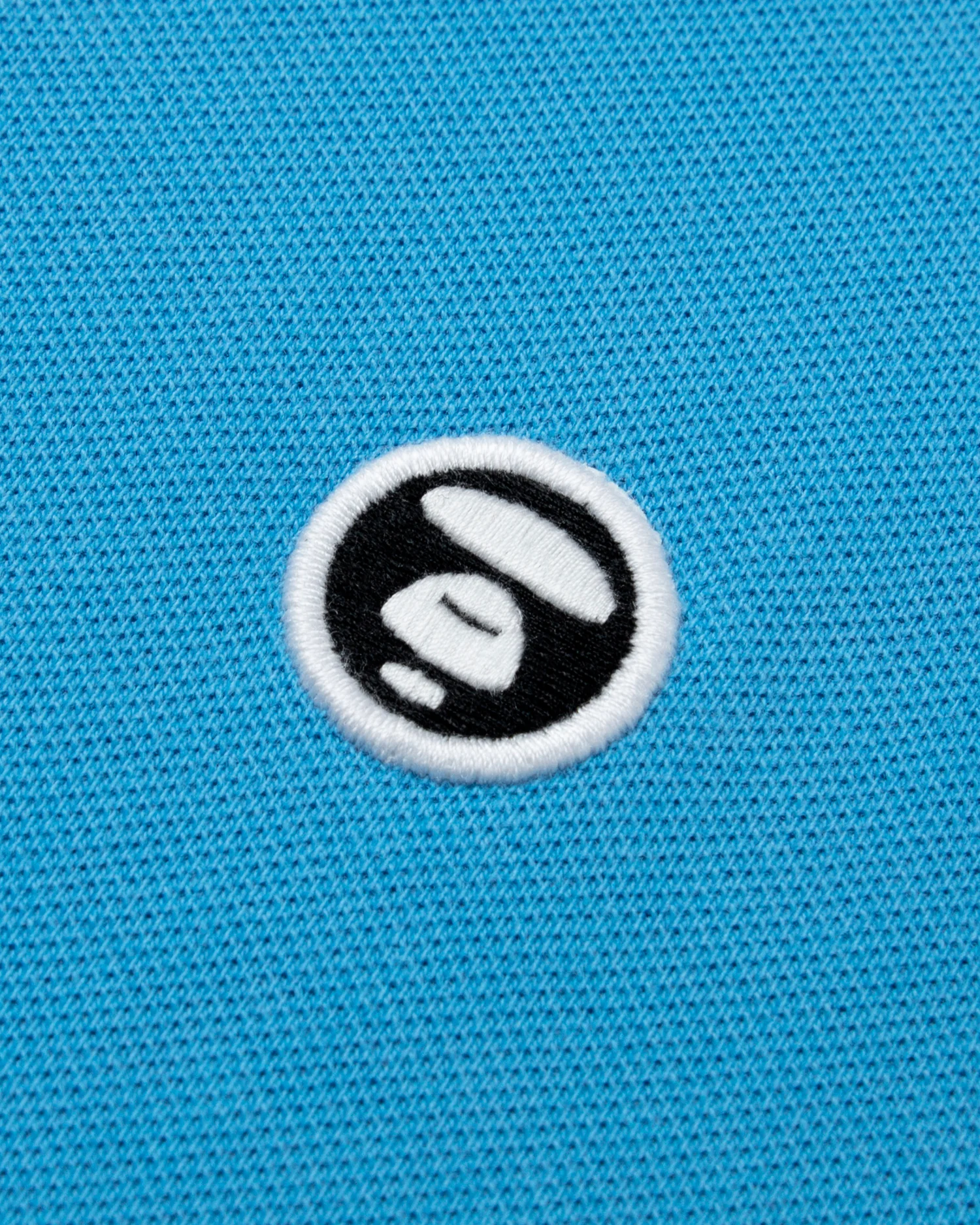 Moonface embroidered twin tipped polo - Image 13
