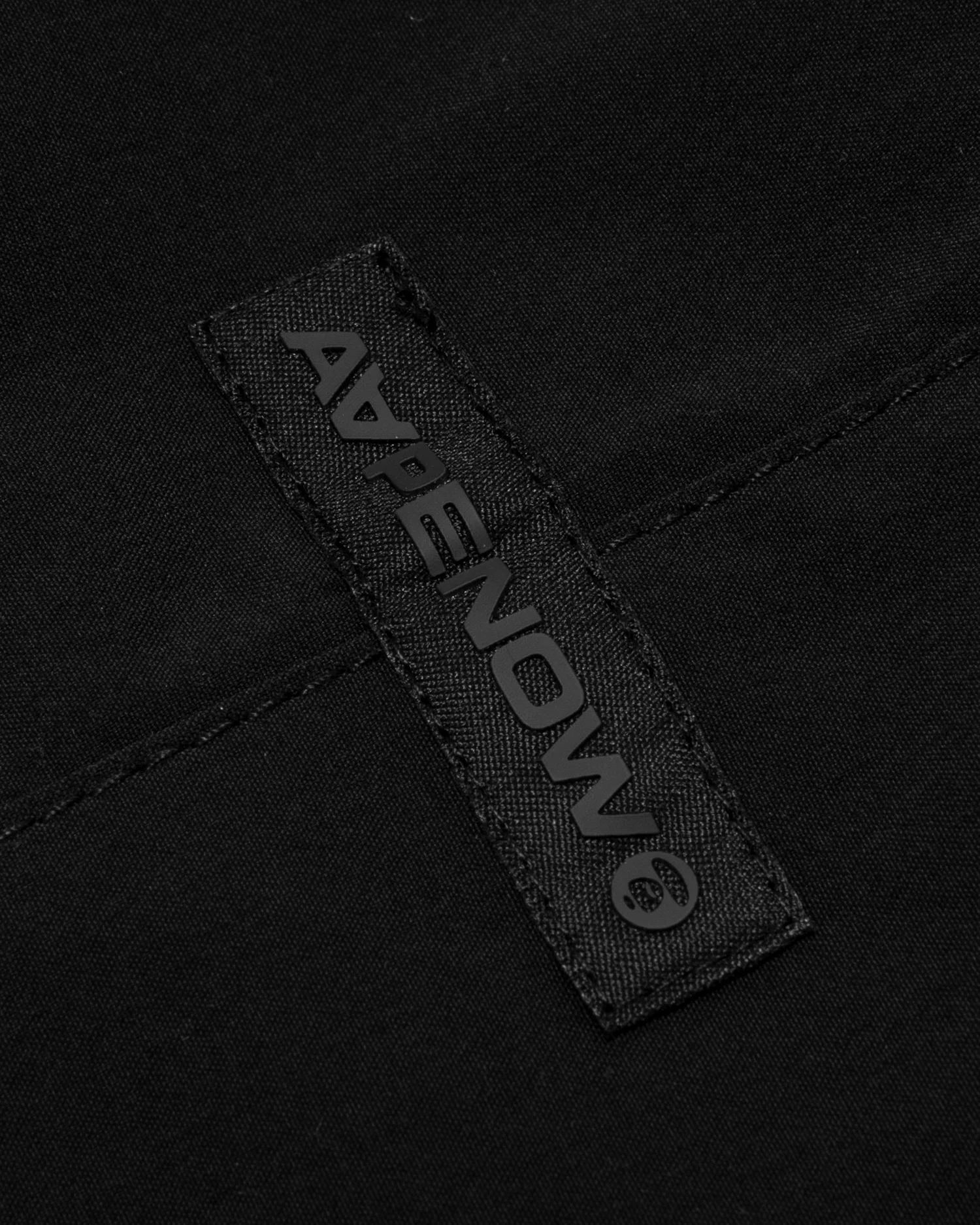 Moonface patch nylon pants - Image 8