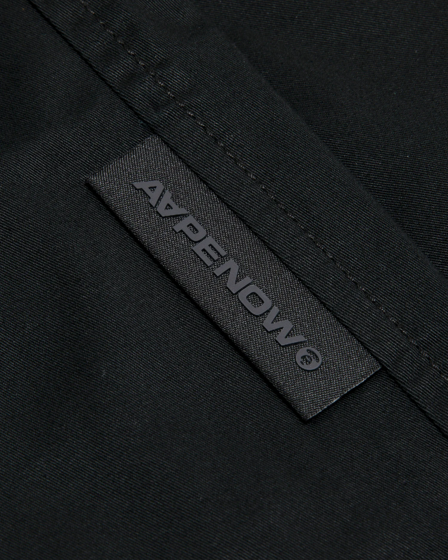 Moonface patch chino pants - Image 10