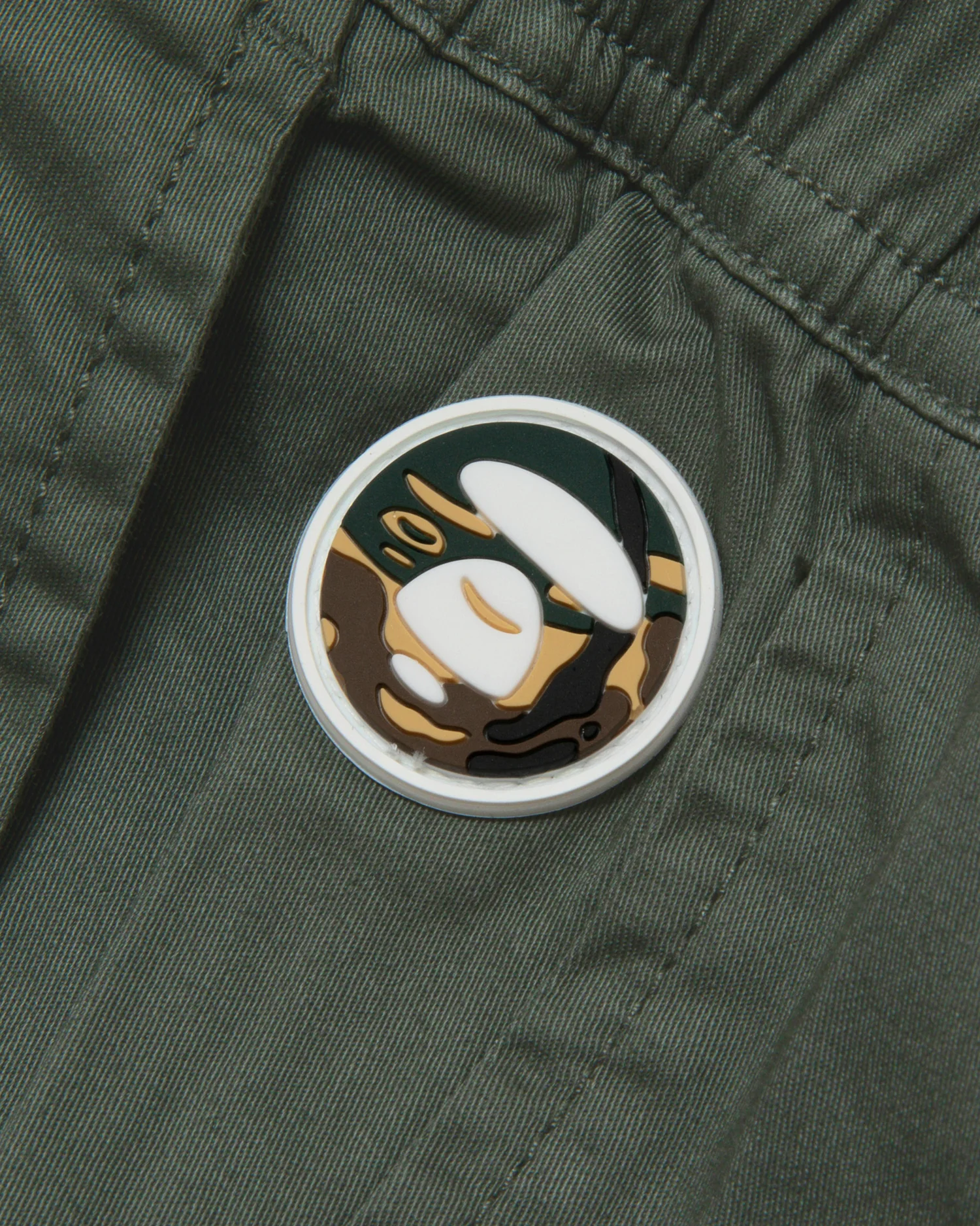 Moonface patch chino pants - Image 13