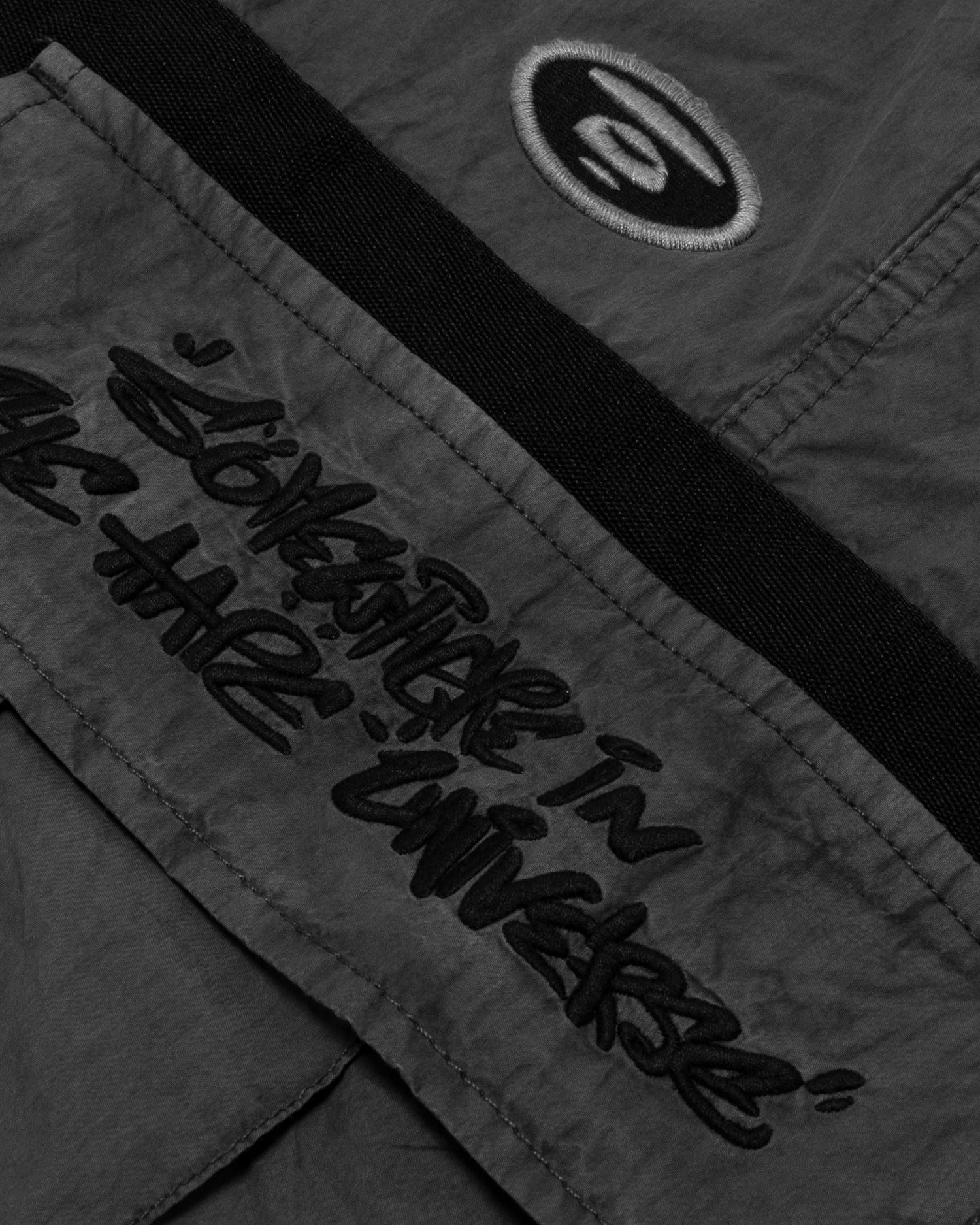Moonface patch cargo pants - Image 9
