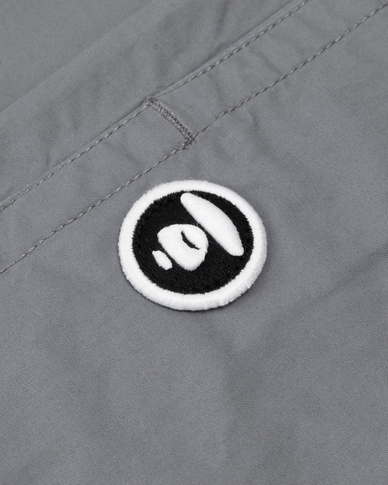 Moonface embroidered reversible camo shorts - Image 12