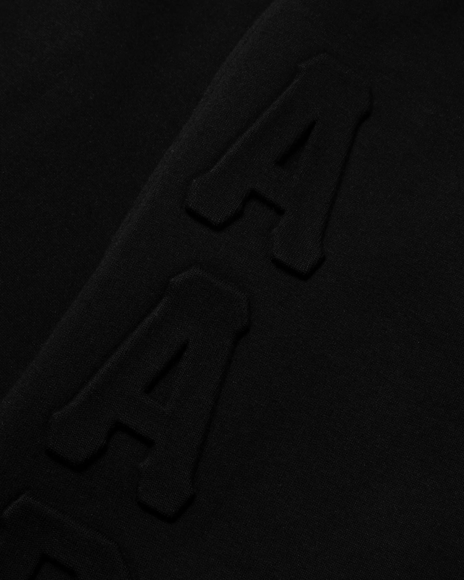 Moonface logo embossed sweat shorts - Image 9